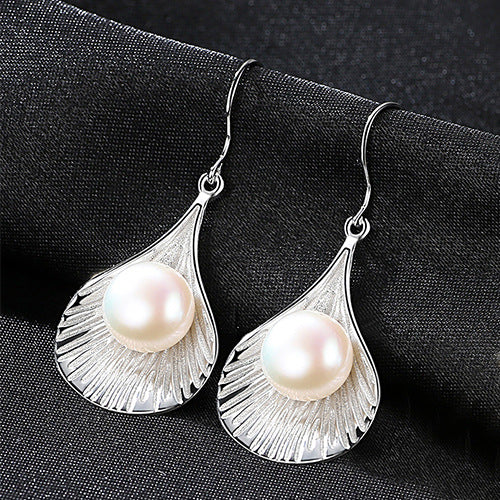 Lunar Luster: S925 Silver Crescent Pearl Stud Earrings