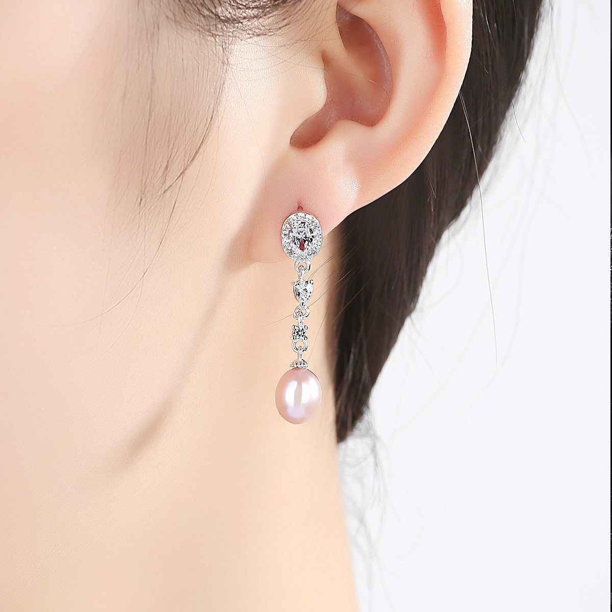 Chic Simplicity: Dainty Pearl Studs for Everyday Glam