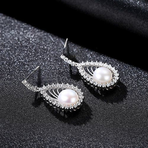 Celestial Pearls: Moon and Star S925 Silver Earstuds