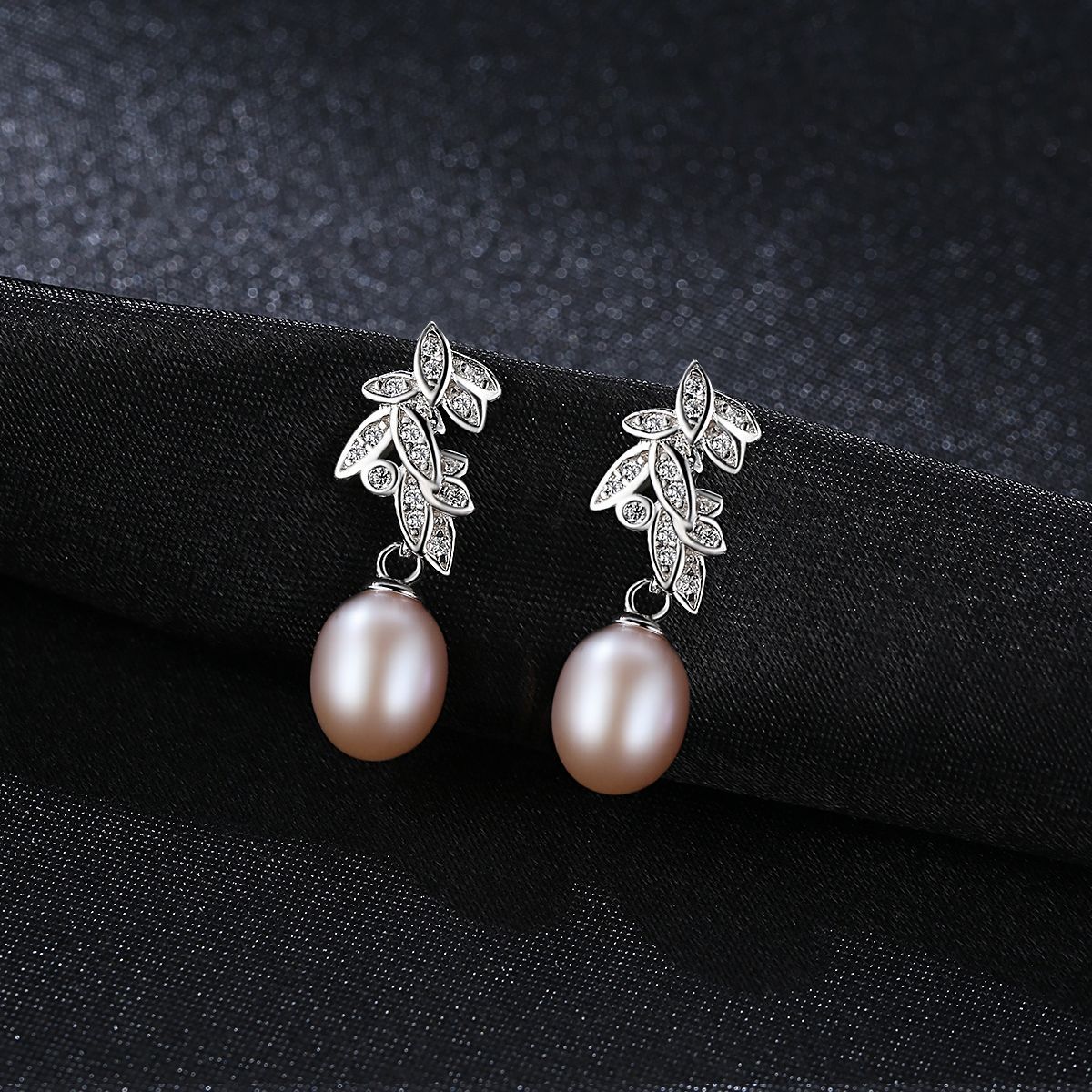 Bohemian Beauty: S925 Silver Feather Pearl Earstuds