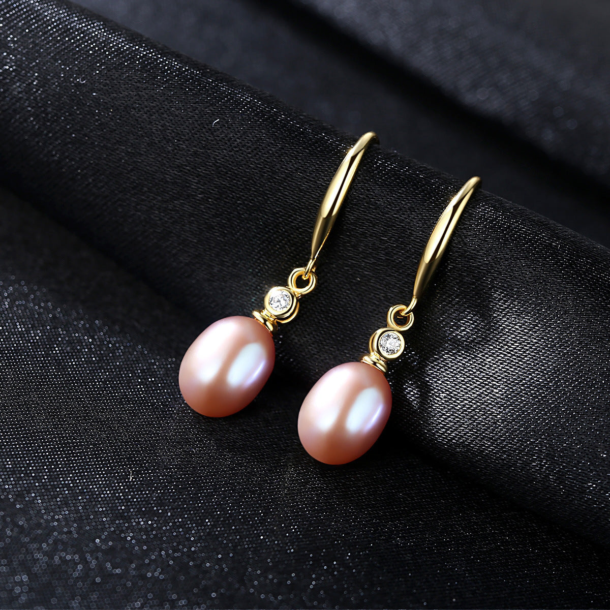 Blushing Beauty: Pink Pearl Stud Earrings for Subtle Charm